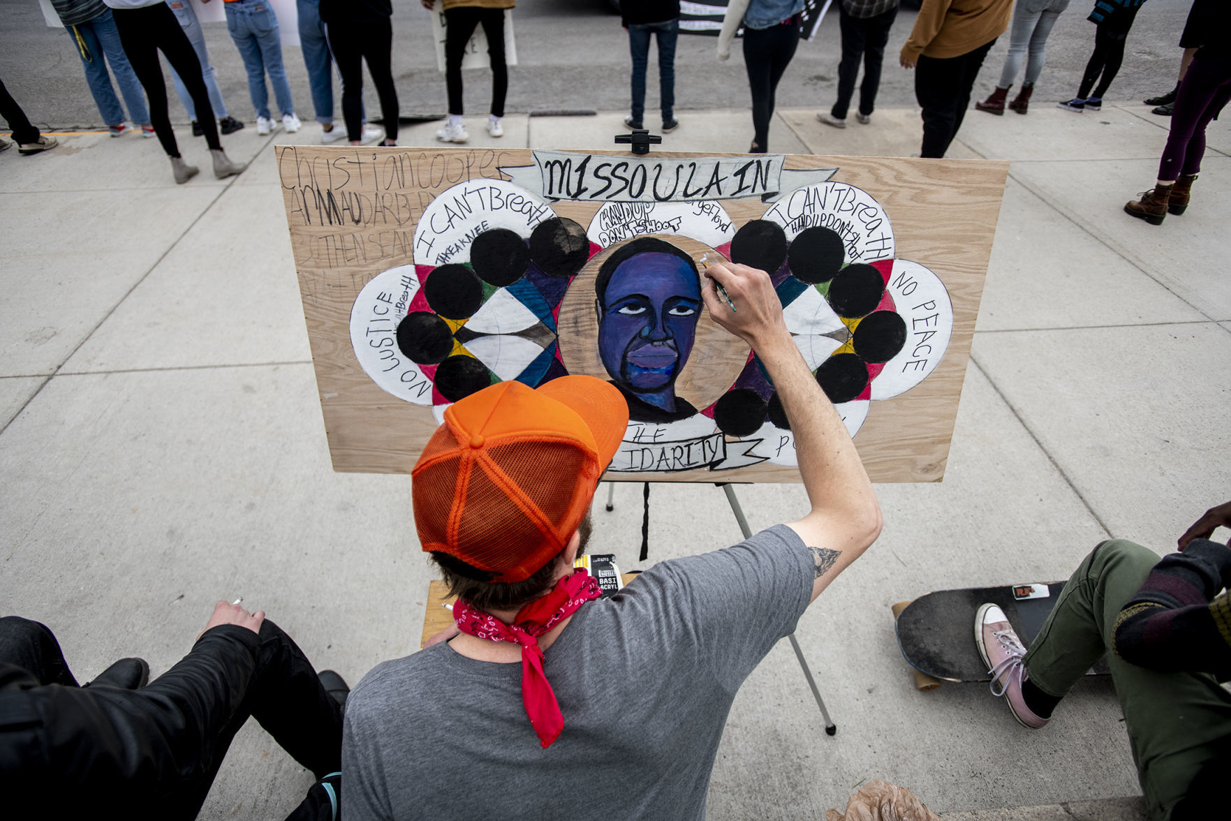 Charlie Lynch paints a mural